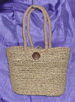 woman woven handbag by art export bali indonesia