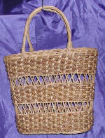 woman woven handbag by art export bali indonesia