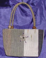 woman woven handbag by art export bali indonesia