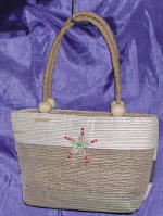 woman woven handbag by art export bali indonesia