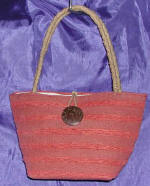 woman woven handbag by art export bali indonesia