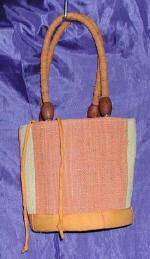 woman woven handbag by art export bali indonesia