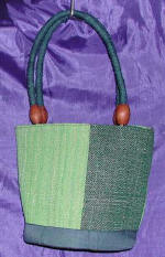 woman woven handbag by art export bali indonesia