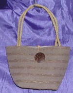 woman woven handbag by art export bali indonesia