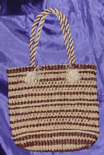 woman woven handbag by art export bali indonesia