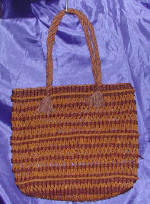 woman woven handbag by art export bali indonesia