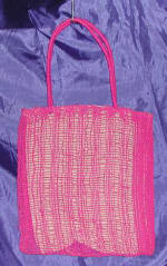 woman woven handbag by art export bali indonesia