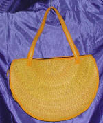 woman woven handbag by art export bali indonesia