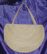 woman woven handbag by art export bali indonesia