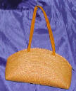 woman woven handbag by art export bali indonesia