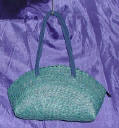 woman woven handbag by art export bali indonesia